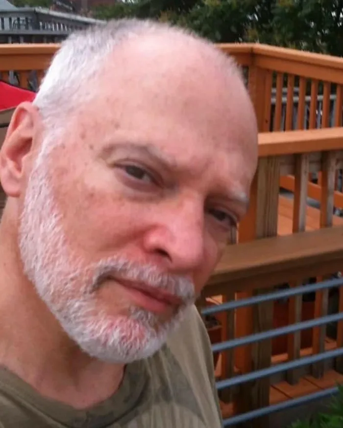 John, the artist behind Votive Vault
